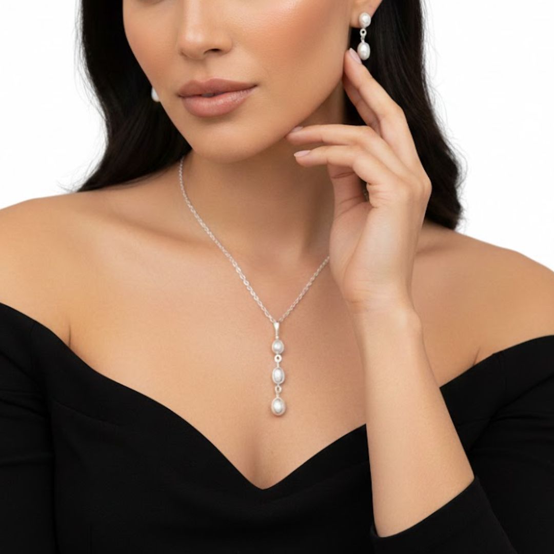 Aretes y Dije patrón gota Plata Primera Ley 0.925 Isabella/Perla incrustada